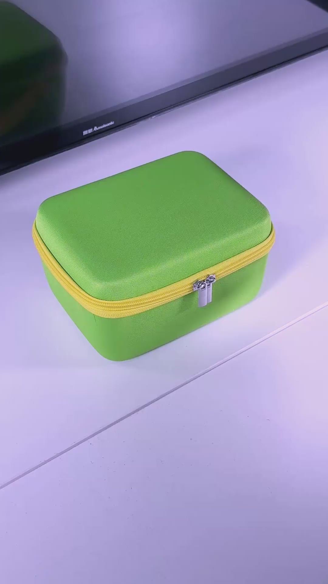 Wonder Trek portable green carrying case for children's active indoor games and family fun.